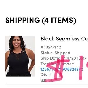 Black cut-out tank from Torrid. Cut-out detailings around collar